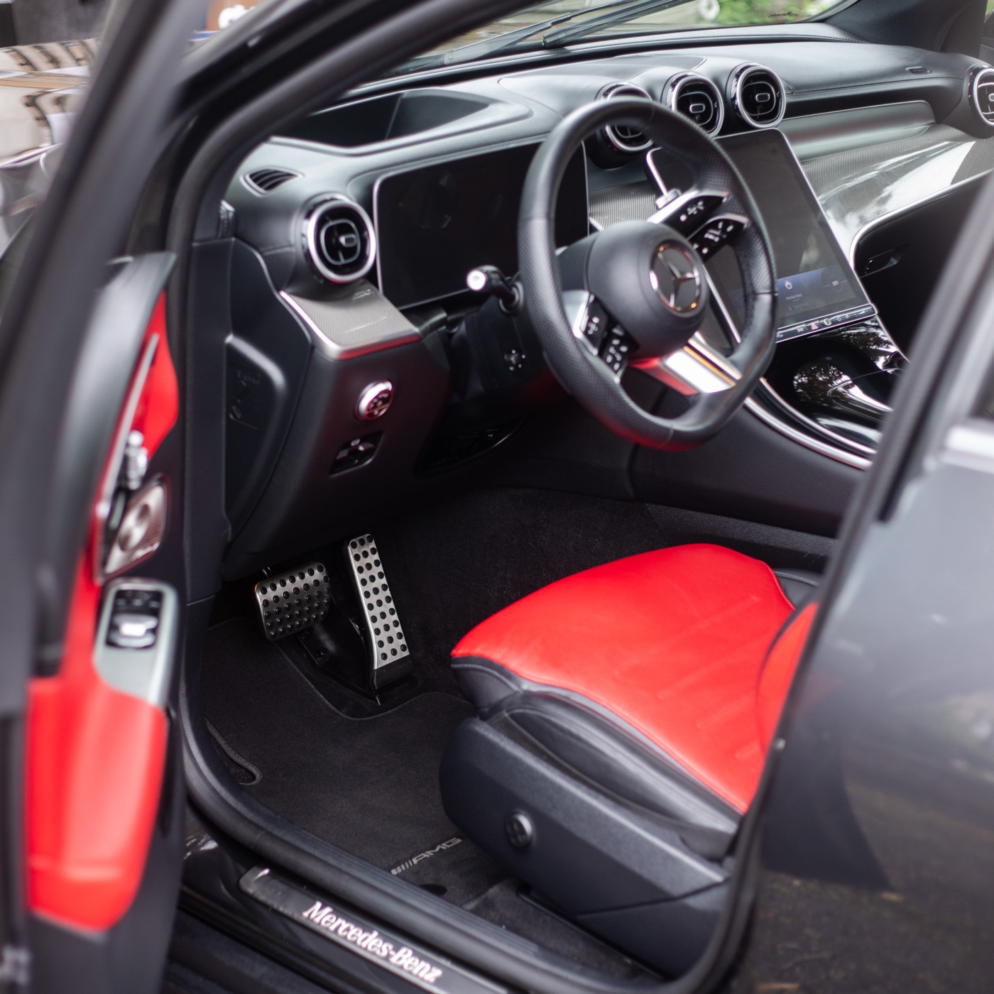 Mercedes C-Class driver footwell deep cleaned with AMG mat