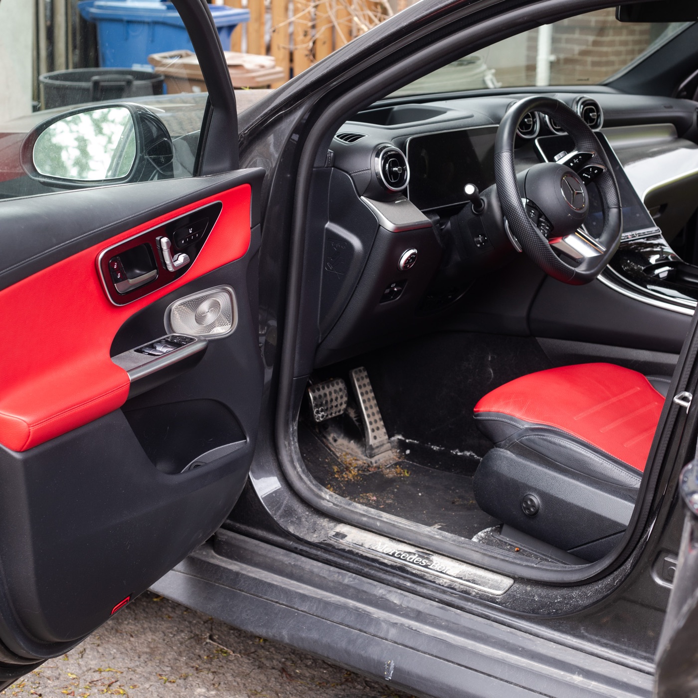 Mercedes C-Class driver footwell with salt and dirt before detail